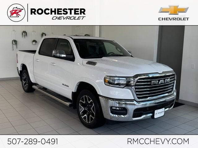 2025 RAM 1500 Laramie Crew Cab 4x4 5'7" Box in White — front three-quarter view
