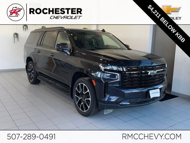 2023 Chevrolet Suburban RST in Dark Ash Metallic — front three-quarter view