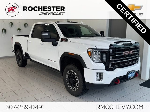 2023 GMC Sierra 2500 HD AT4 in Summit White — front three-quarter view