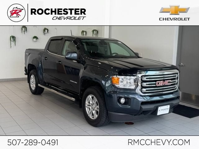 2019 GMC Canyon 4WD SLE in Dark Sky Metallic — front three-quarter view