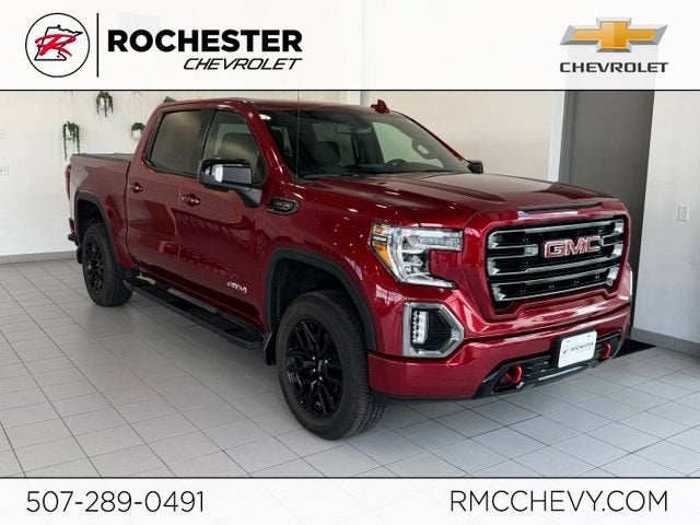 2021 GMC Sierra 1500 AT4 in Cayenne Red Tintcoat — front three-quarter view