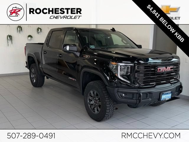 2024 GMC Sierra 1500 AT4X in Onyx Black — front three-quarter view