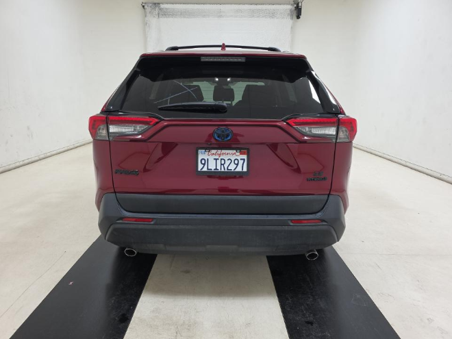 2024 Toyota RAV4 Hybrid — rear three-quarter view