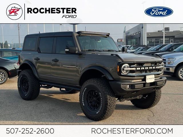2025 Ford Bronco Outer Banks w/Custom Camo Wrap! in Gray — front three-quarter view
