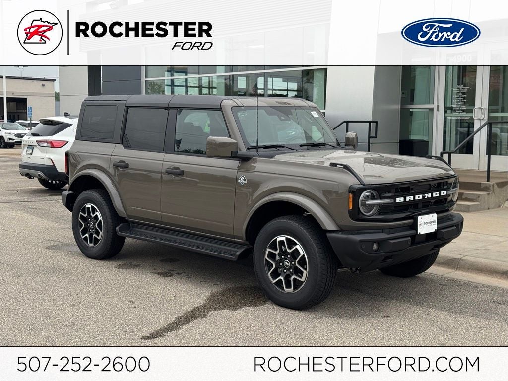 2026 Ford Bronco Outer Banks w/Heated Steering Wheel + Adaptive Cruise in Marsh Gray — front three-quarter view