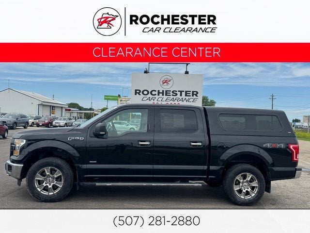 2015 Ford F-150 XLT in Tuxedo Black Metallic — front three-quarter view