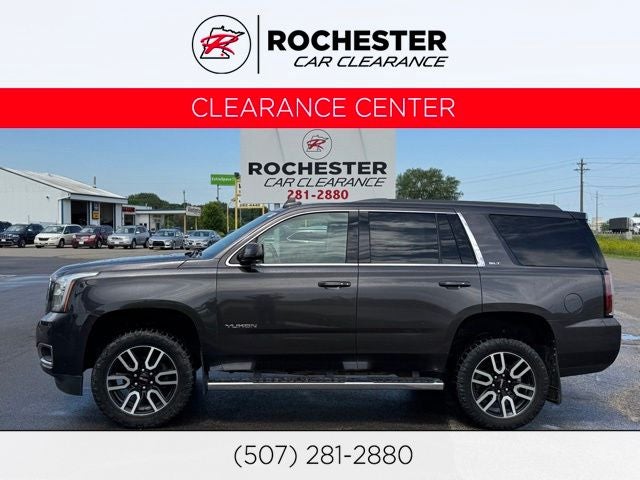 2017 GMC Yukon SLT in Iridium Metallic — front three-quarter view